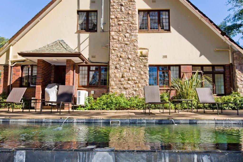 Отель Eagle Wind Manor Хиллкрест Экстерьер фото